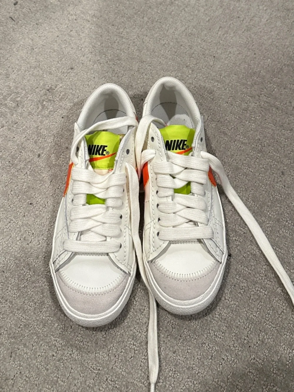 Nike White Sneakers with Neon Green Tongue and Orange Swoosh